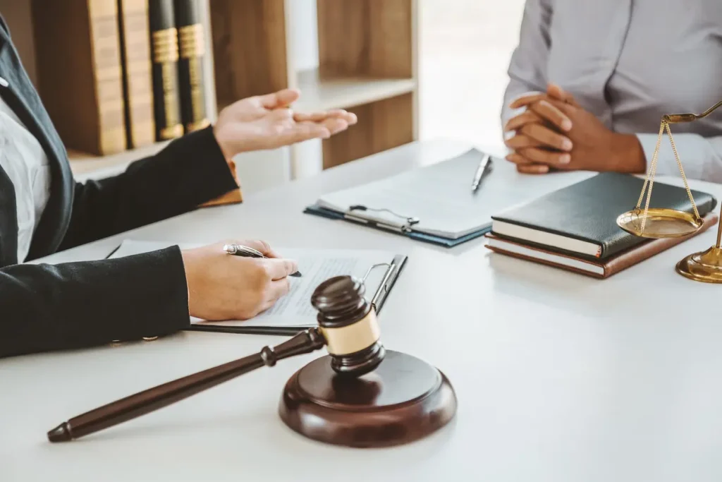 client meeting with lawyer with gavel