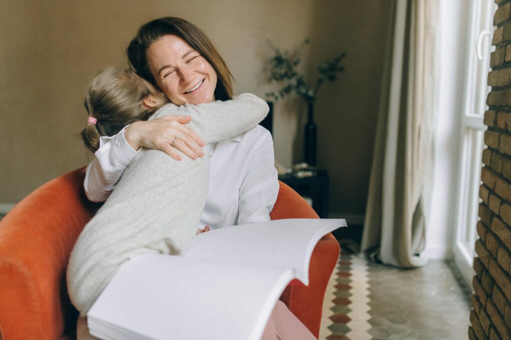 mother hugging child